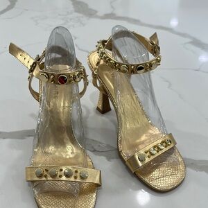 Gold Stiletto Heels with Star Embellishments